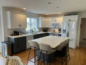 Bright updated kitchen with two-tone cabinets and modern finishes completed during a kitchen renovation in Rockford, MI