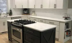 kitchen cabinets with new gold hardware showcasing professional cabinet repainting grand rapids mi service.